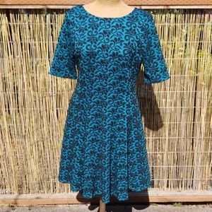 Danny and nicole size 16 poly spandex flare dress